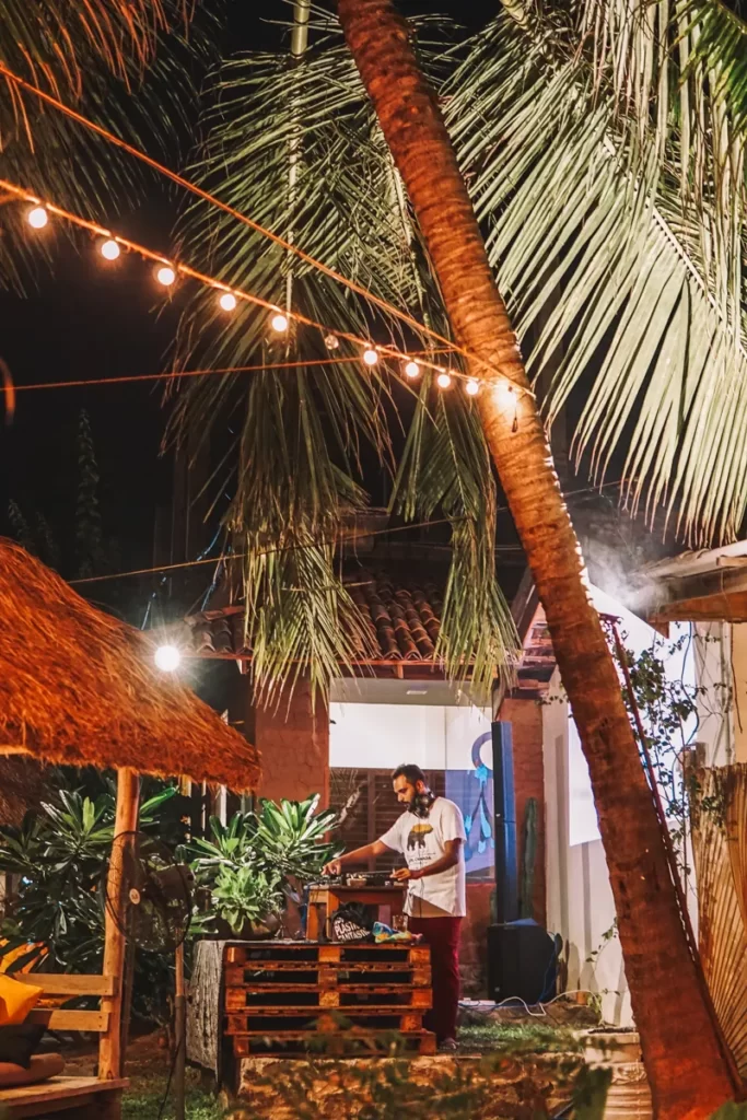 A DJ play music at night at Salty Swamis near Arugam Bay