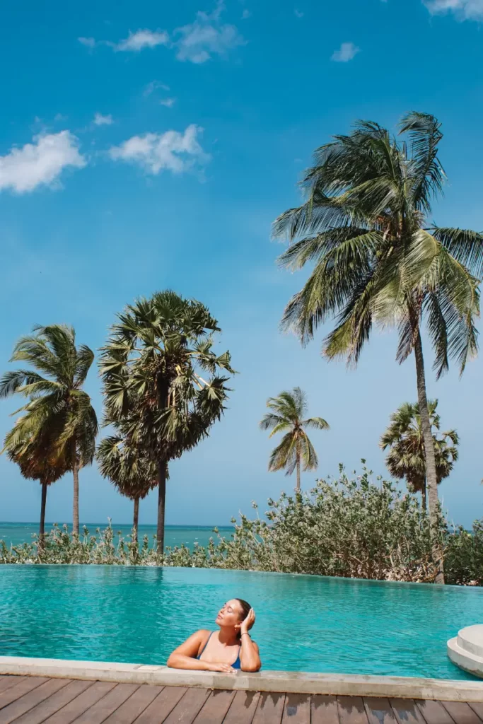 A girl is chilling in the pool on kottukal beach