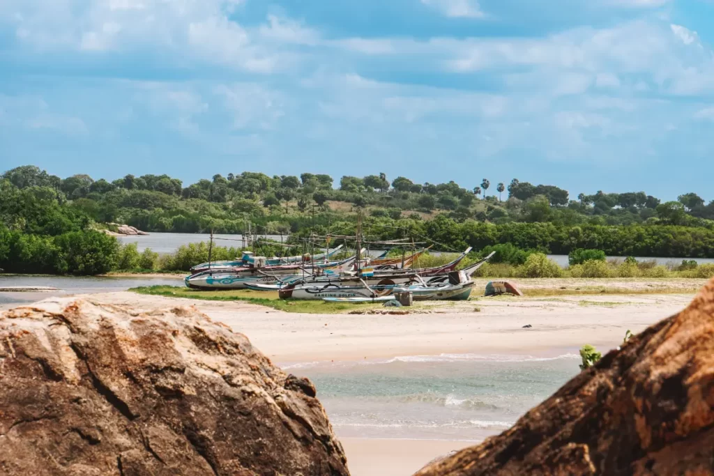 Boats on the banks between two rocks on Panama Beach