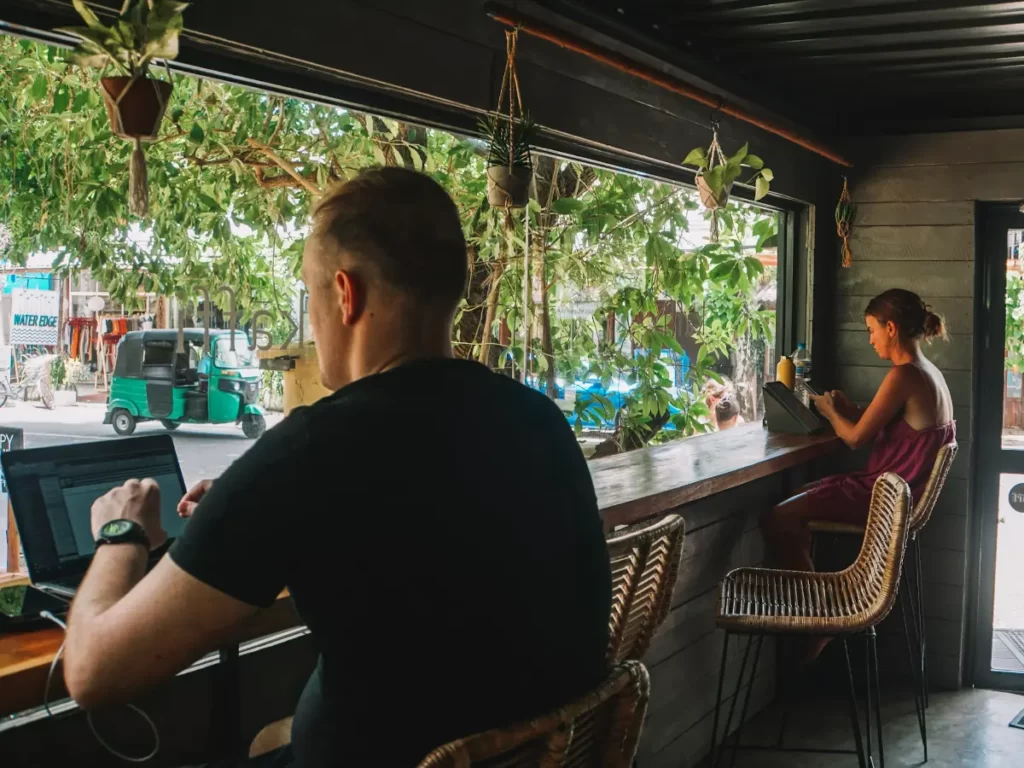 Two digital nomads work from Kaffi coffee shop in Arugam Bay