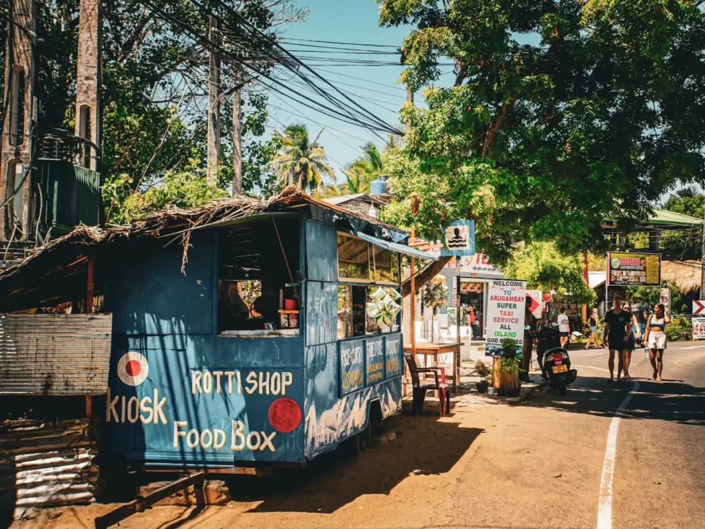 A small roti shop inside a food truck on Arugam Bay high street