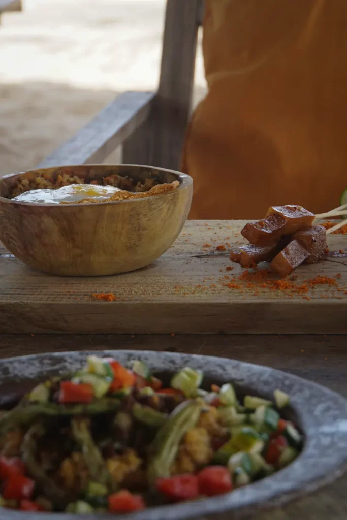 A greek salad and dahl mashup meal at Hilltop Cabanas