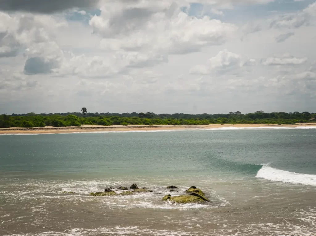 A small wave at Panama Point surf break near Arugam Bay