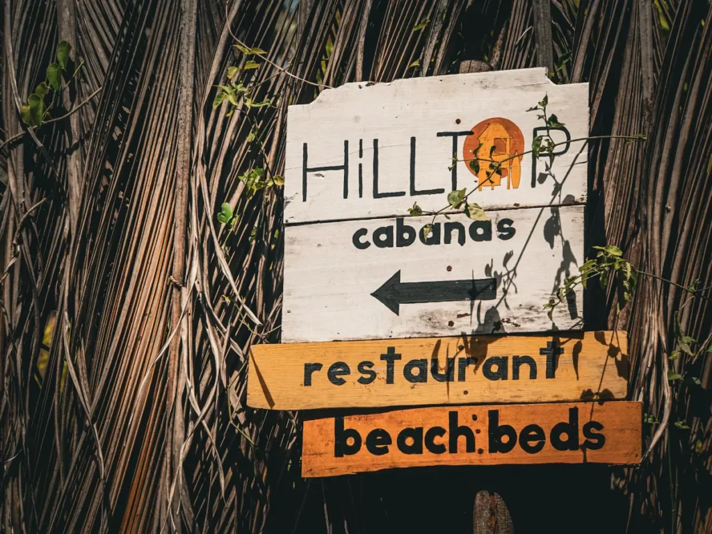 The sign to point customers in the right direction to Hilltop Cabanas