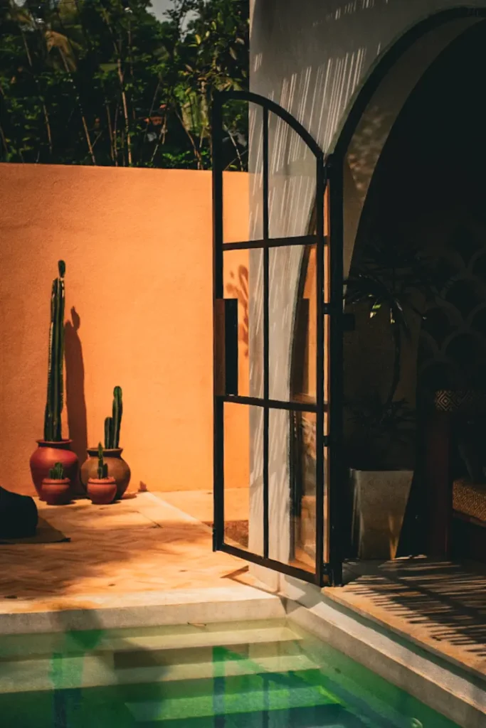 The swimming pool and doors at Black Honey Ahangama