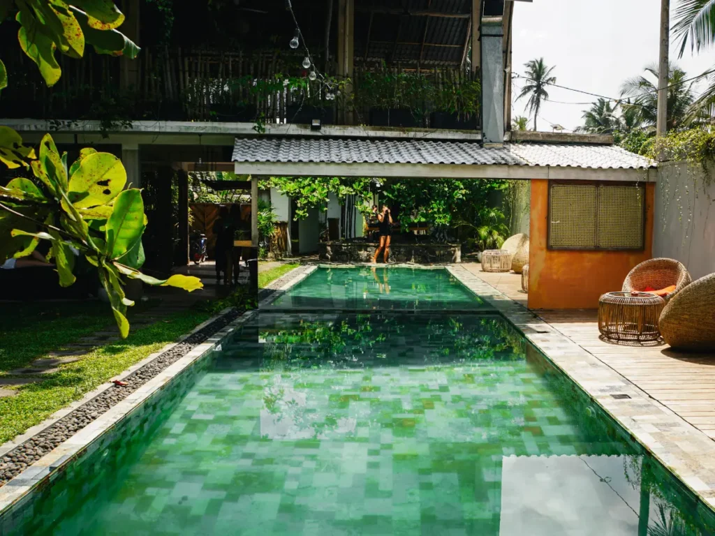 The swimming pool and garden at Nuga House