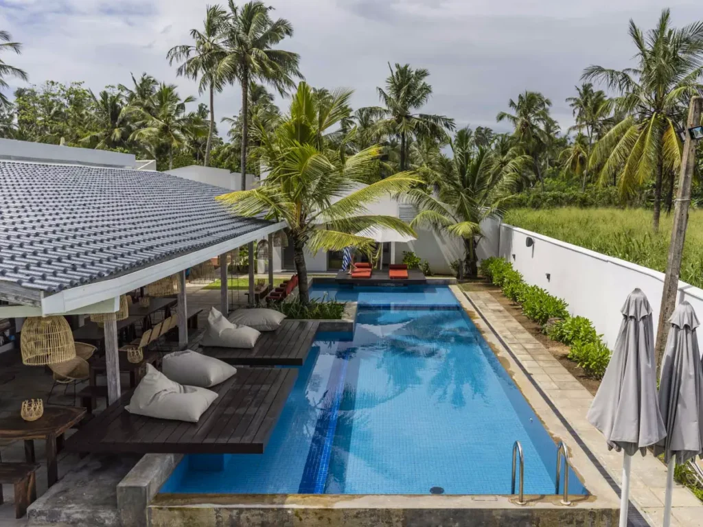 The pool and chill out area of Global Surf School, Ahangama