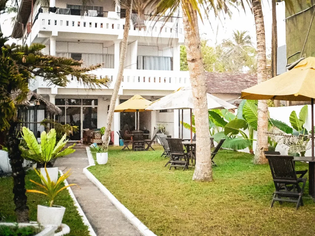 The garden at Tharanga Surfing Villa, one of the best budget beachfront hotels in Ahangama