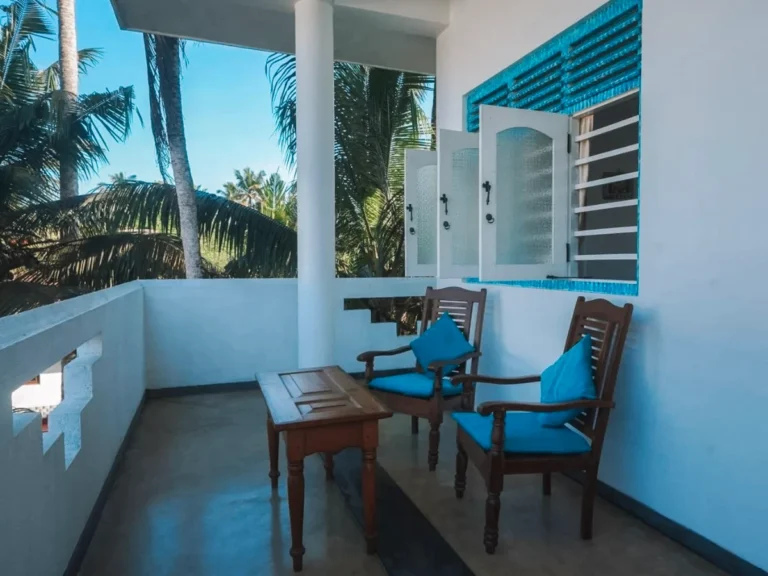 The balcony and seating areas of Casa Tharin in Madiha