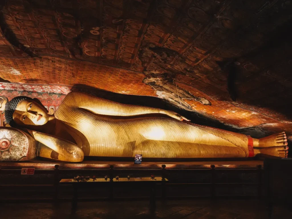 A lying Buddha inside the Dambulla Cave Temple, one of the top things to see in Sigiriya