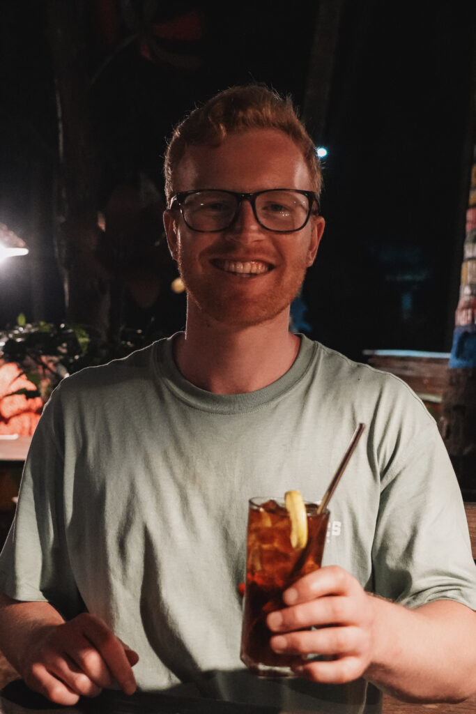 A man drinks a cocktail at Rastarant in Sigiriya
