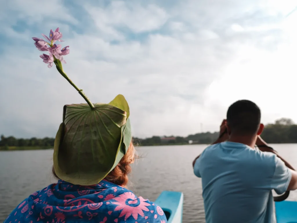 A girl on a boat ride on a village tour in Sigiriya