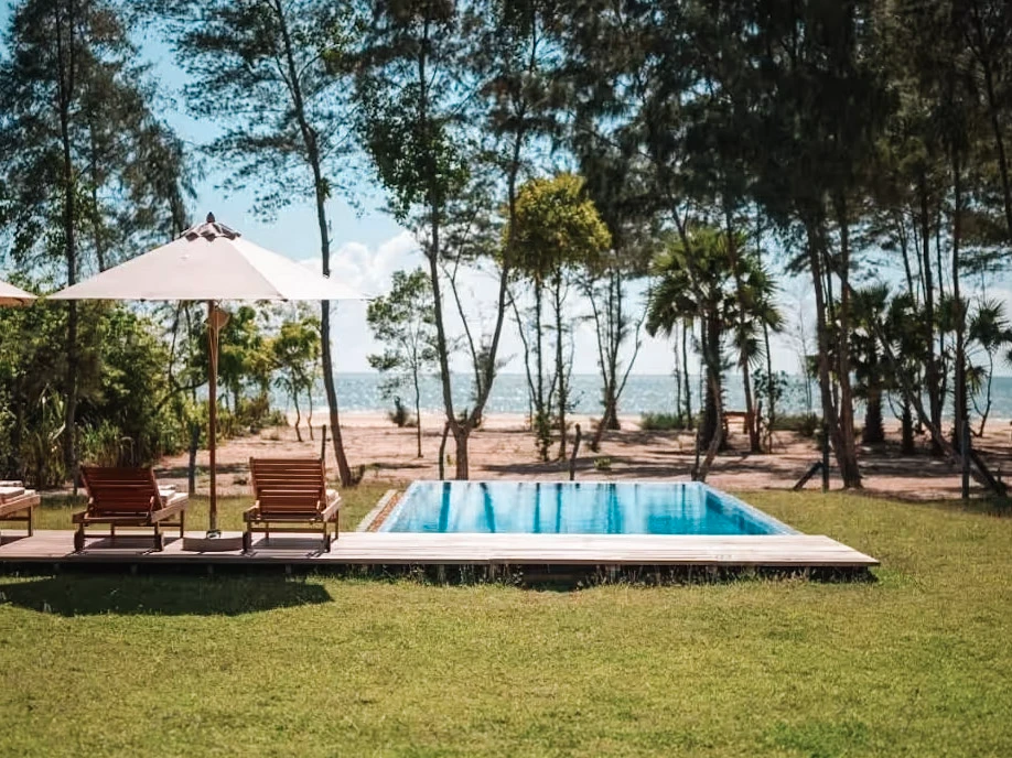 The pool and beach view at Niketh Villa, a great hotel option