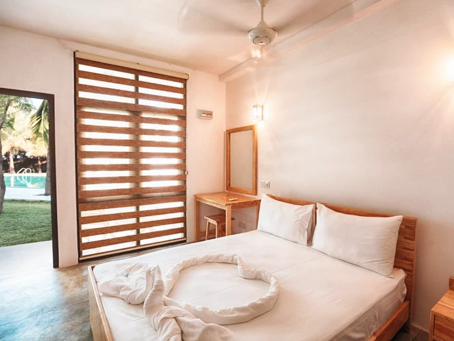 A pool view bedroom at Roccos in Arugam Bay
