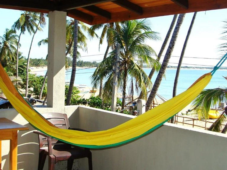 A hammock on a balcony at Rupa's, a top budget hotel