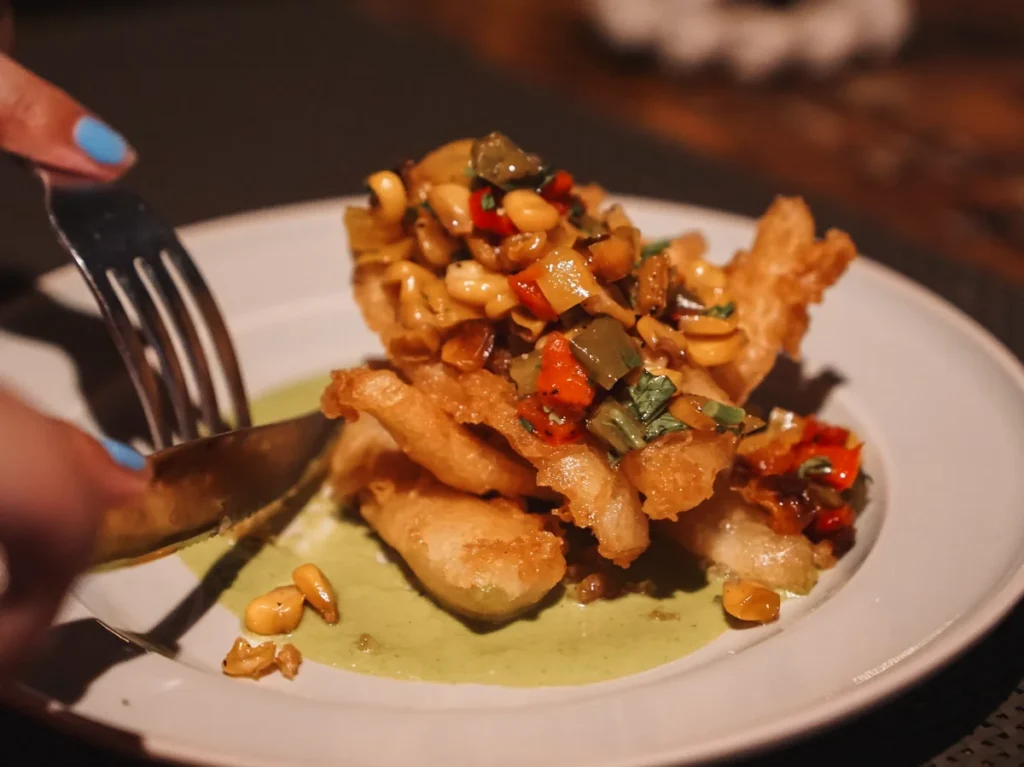 Indulge in the local BBQ cuisine at Smoke and Bitters Hiriketiya