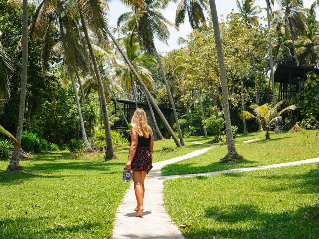 A girl walking at The Palm in Ahangama